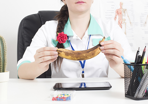 woman holding banana